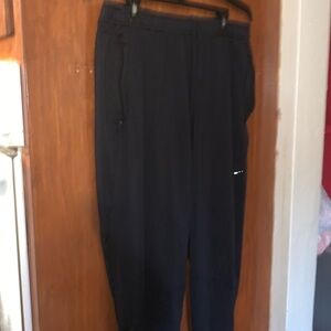 Nike dri fit joggers with zipped pockets and pouch on the backside